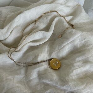 Gold butterfly locket